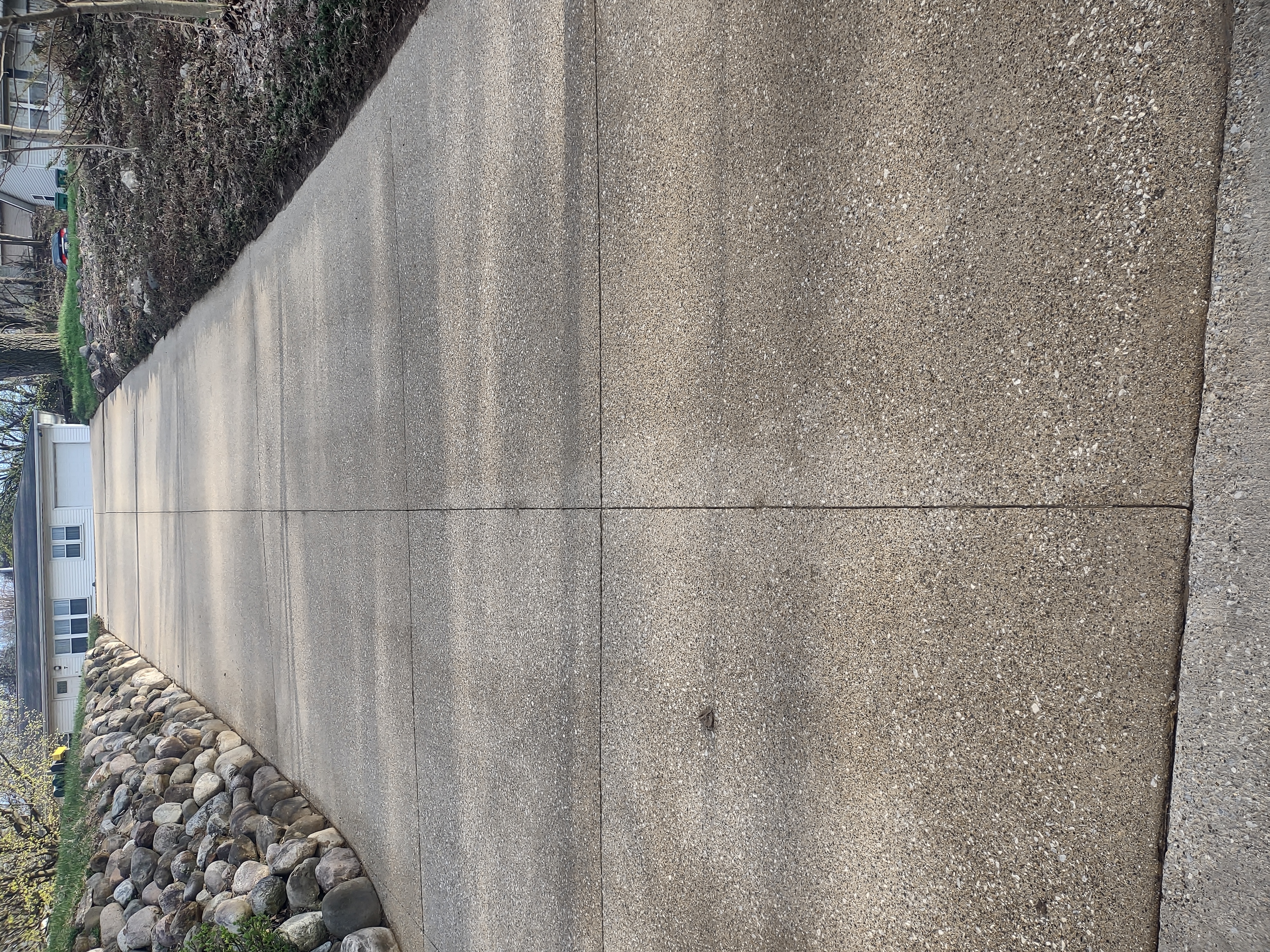 Transformative Surface Cleaning Results in Battle Creek, MI by Strong Arm Power Washing!